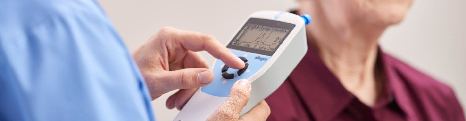 Audiologist Reviewing Tympanometry test results